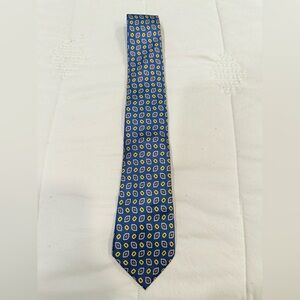 Banana Republic silk tie. Navy background with red, gold, & light blue design